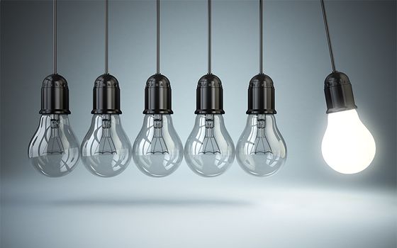 Lightbulbs hanging like a pendulum